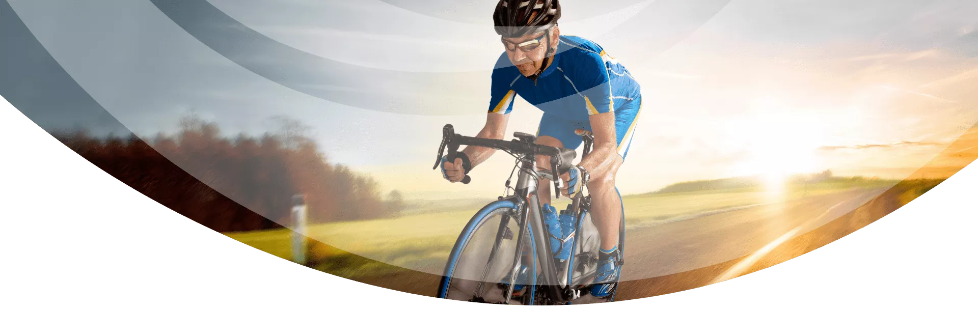 man cycling on a highway