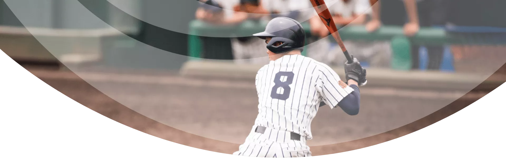 young man playing baseball